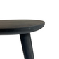 Ebonised wooden side table close up